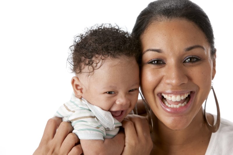 Real People: Laughing Black Mother and Baby Boy Head Shoulders