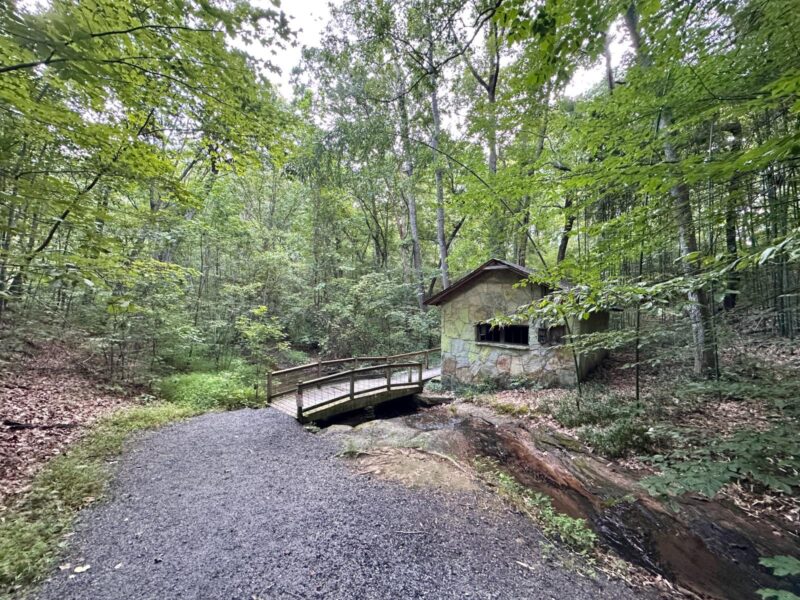 Chinqua-Penn Trail bridge next to a house