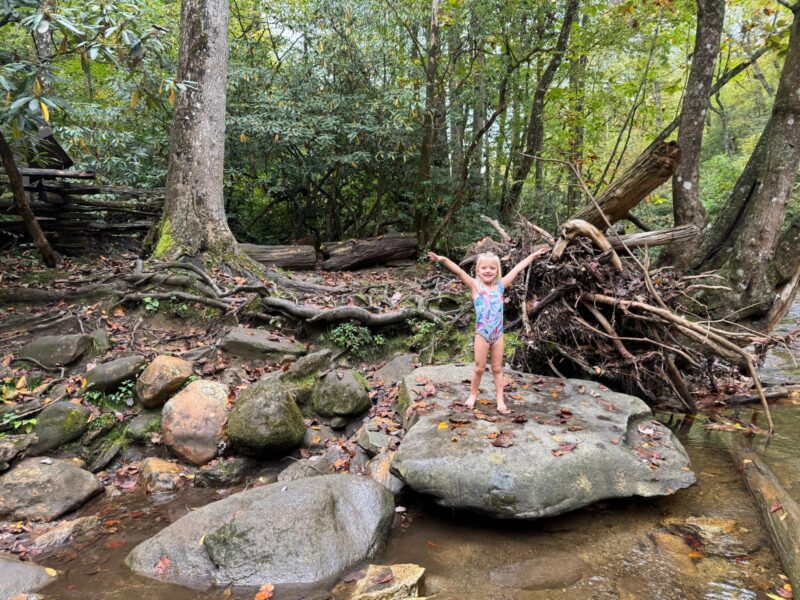 Sliding Rock NC kid in a rock