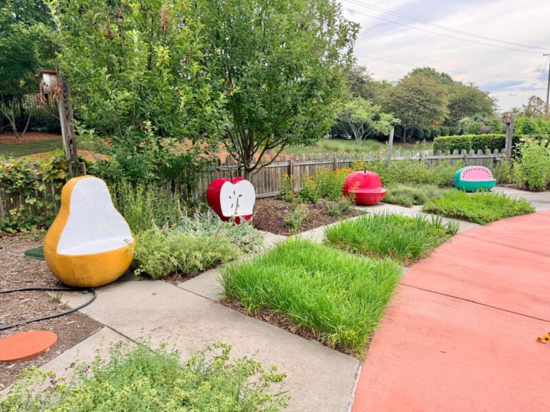 The Michel Family Children’s Garden Gateway gardens Greensboro apples structure fruit chairs