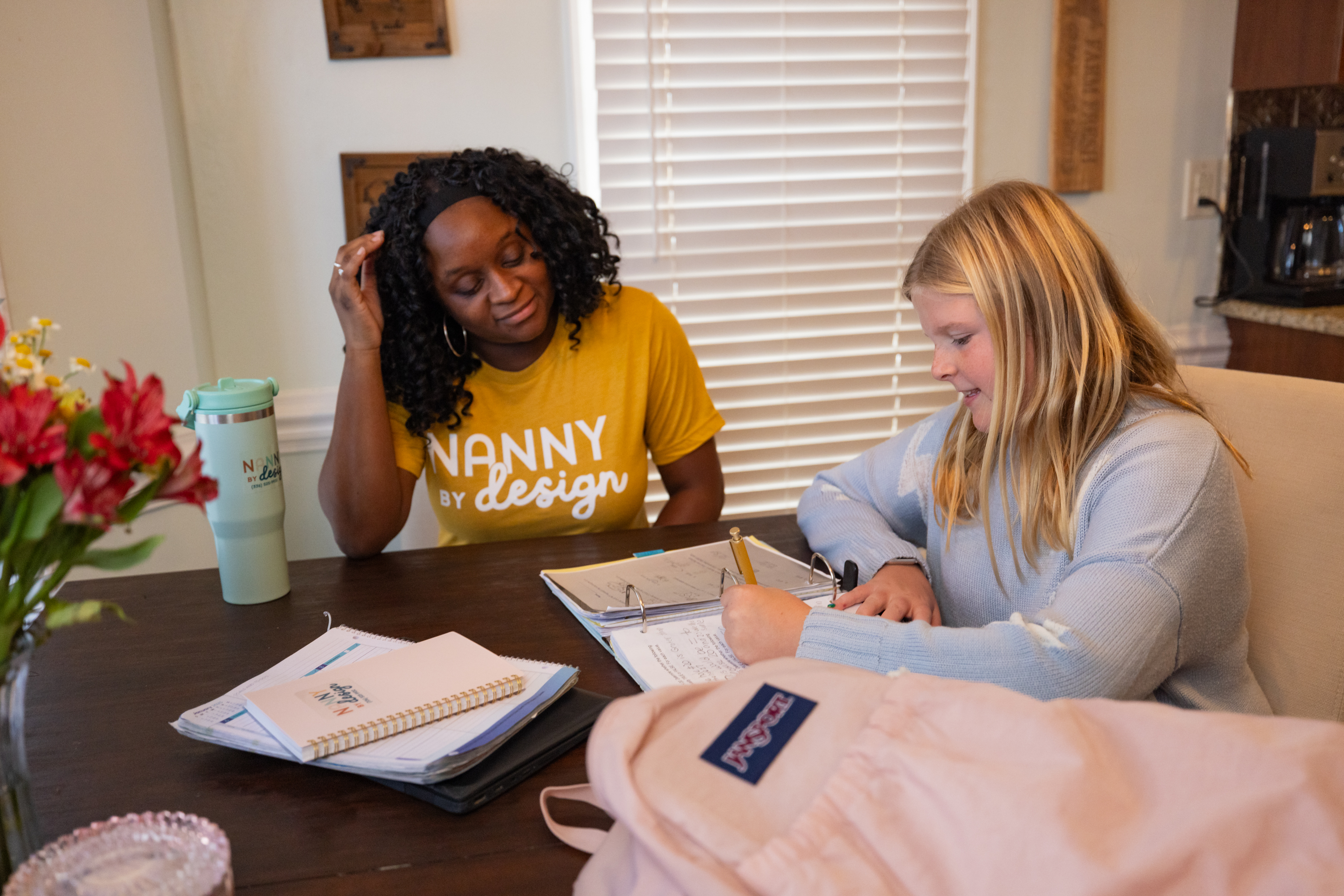 Nanny Helping with Homework